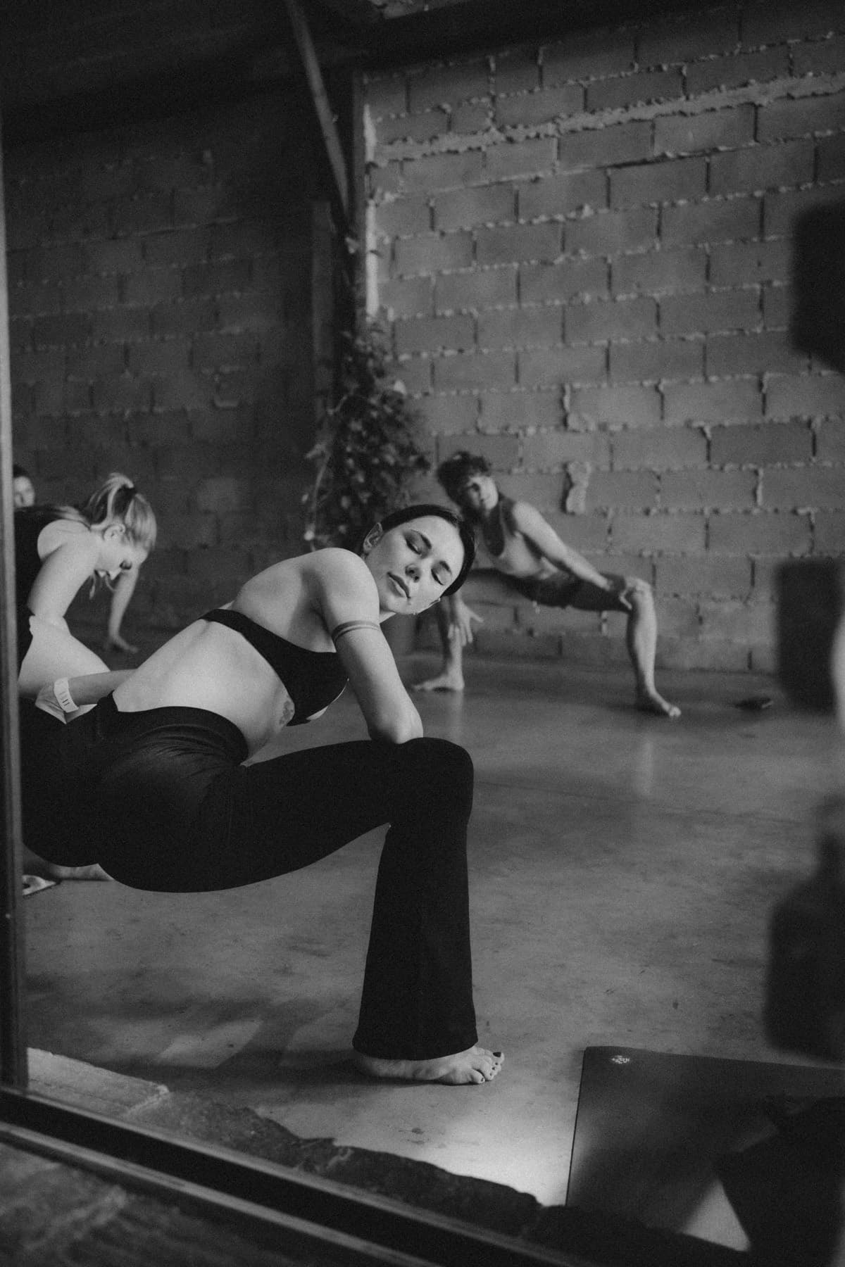 Movement in the hall.