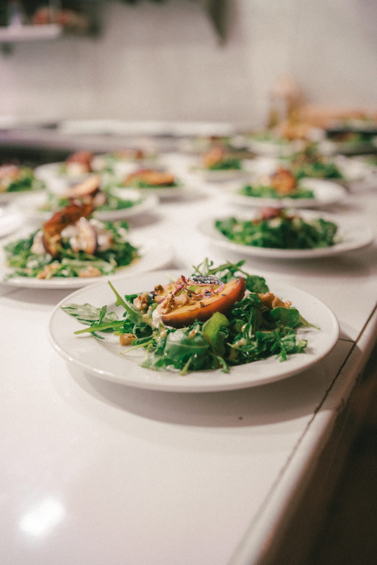 Plates leaving the TEJÁ kitchen